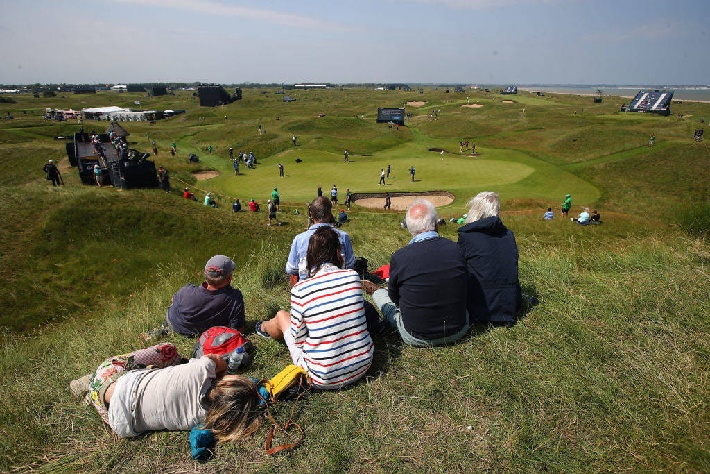 Spectators on hill